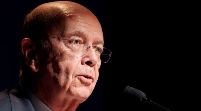 Commerce chief tells strapped federal workers to get loans