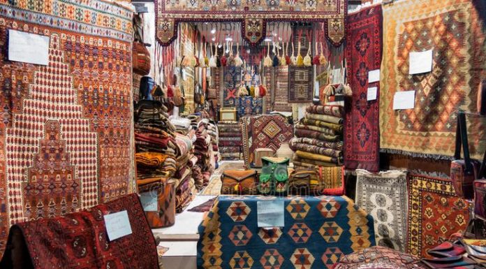 Wall to wall carpeting vs. carpet tiles